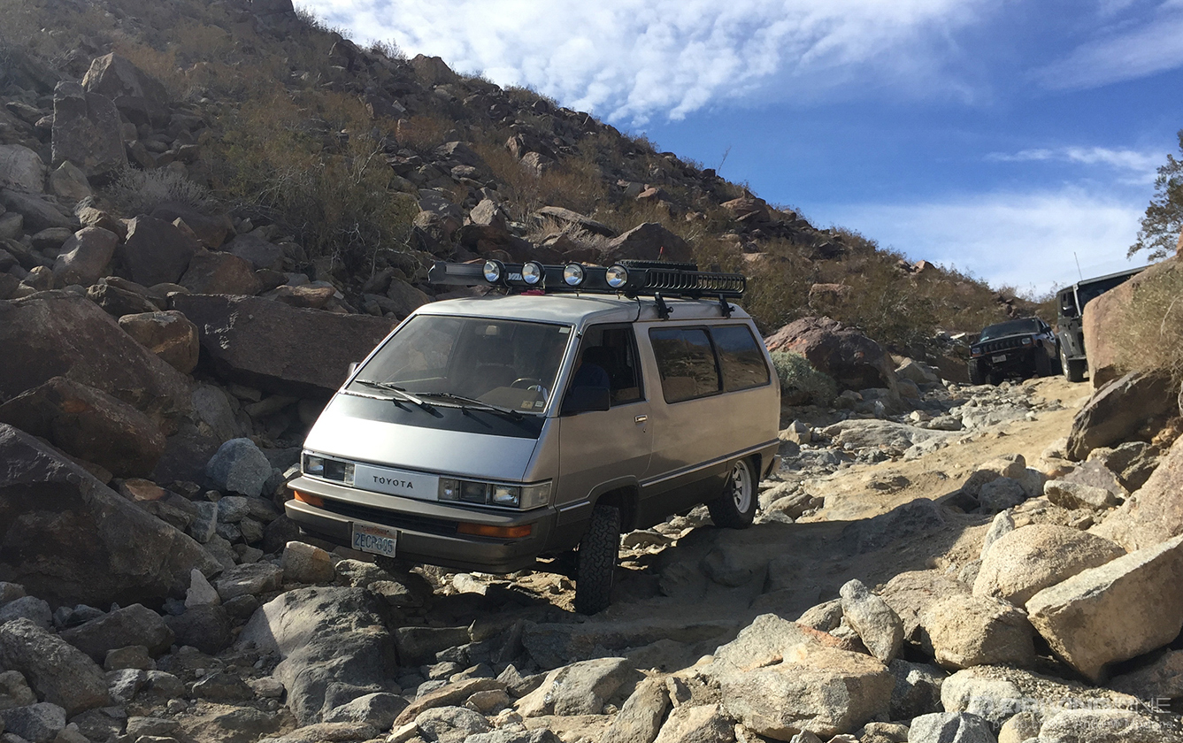4x4 Toyota Van going over rocks