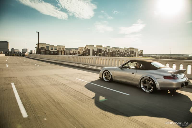 Gas Monkey Garage LS-Swapped Porsche 996 driving on a bridge