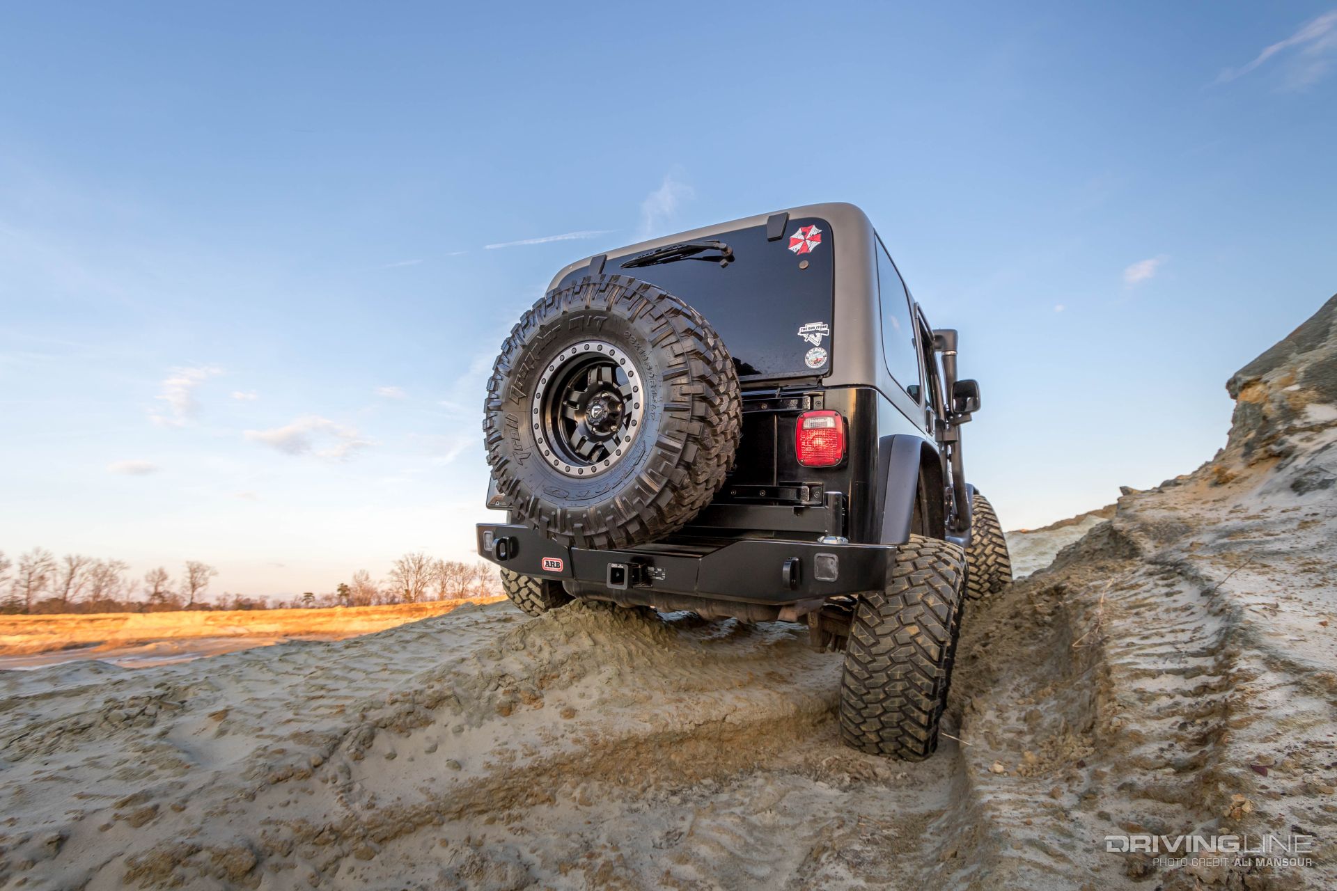 001-jeep-wrangler-tj-arb-rear-bumper-tire-carrier-trail-grappler
