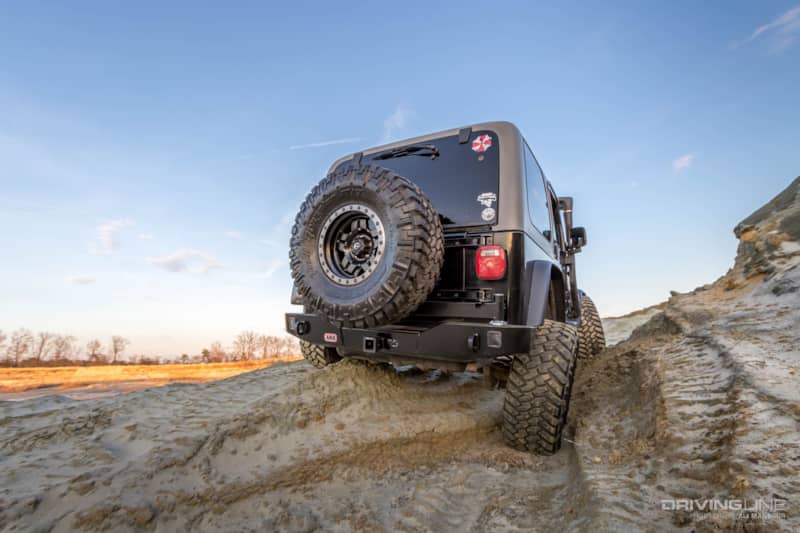 001-jeep-wrangler-tj-arb-rear-bumper-tire-carrier-trail-grappler