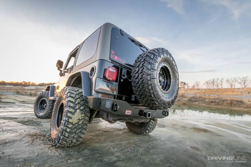 001-jeep-wrangler-tj-arb-rear-bumper-tire-carrier-trail-grappler