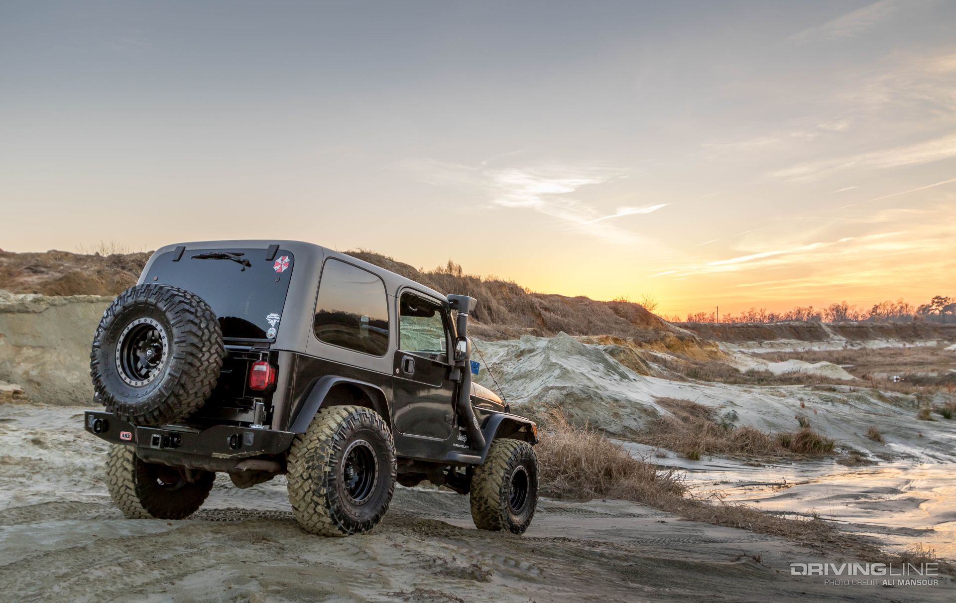 001-jeep-wrangler-tj-arb-rear-bumper-tire-carrier-trail-grappler