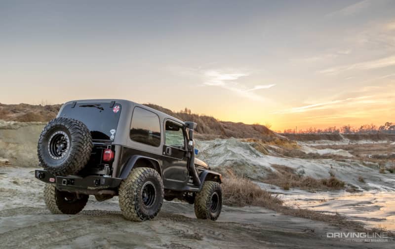 001-jeep-wrangler-tj-arb-rear-bumper-tire-carrier-trail-grappler