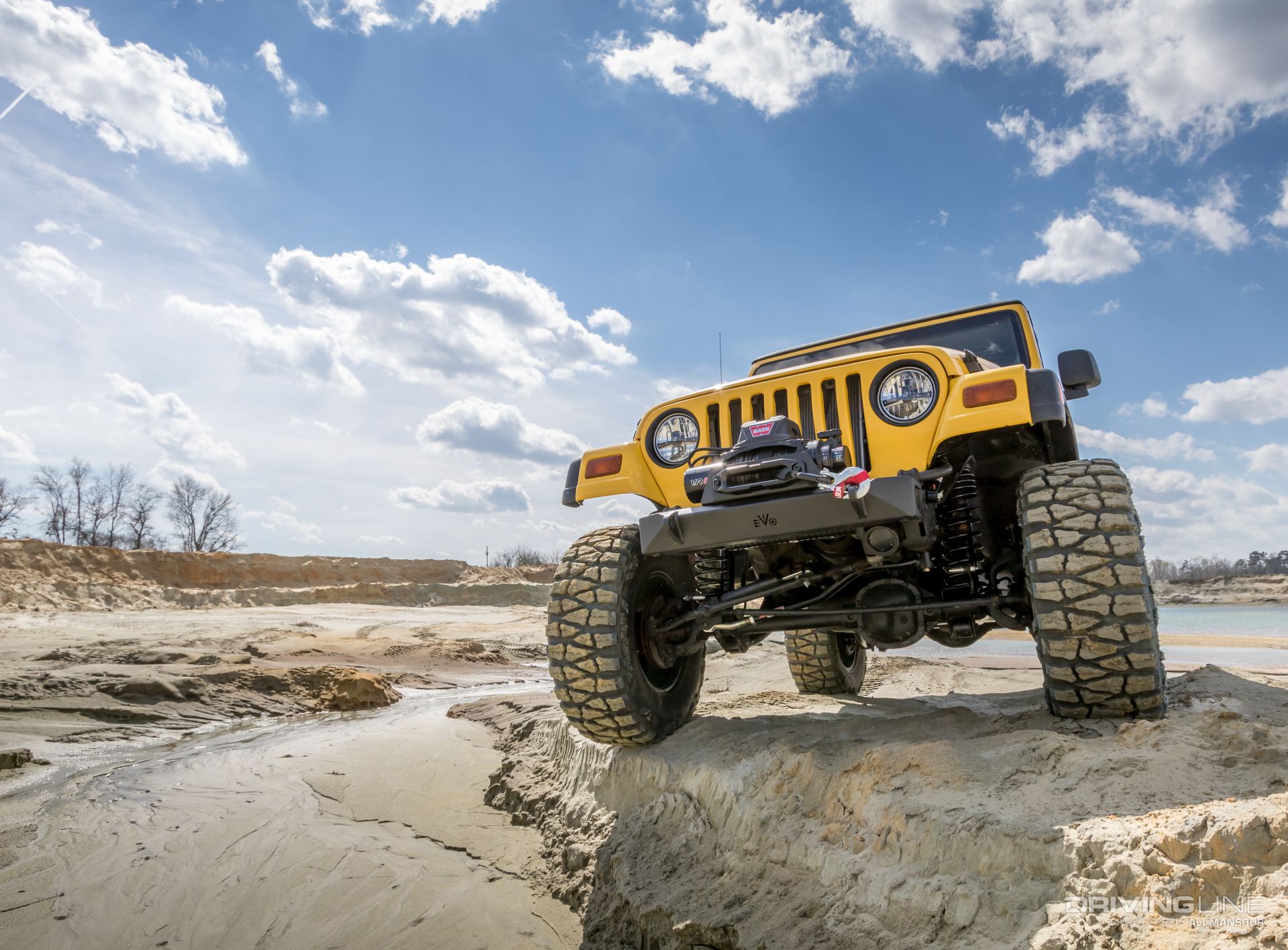 Jeep-wrangler-tj-evo-mfg-bumpers-warn-vr8-s-winch-mud-grapplers