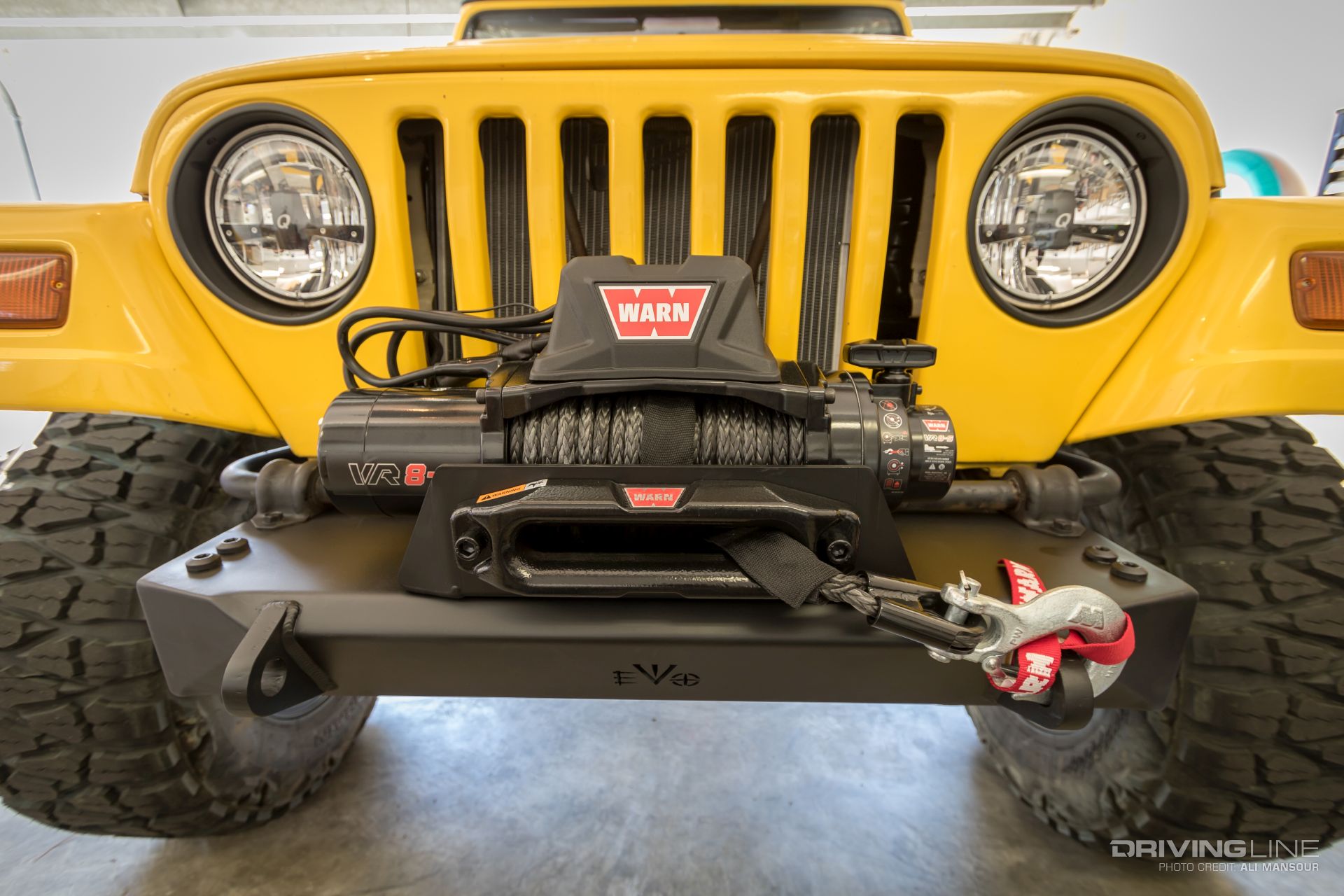 Jeep-wrangler-tj-evo-mfg-bumpers-warn-vr8-s-winch-mud-grapplers