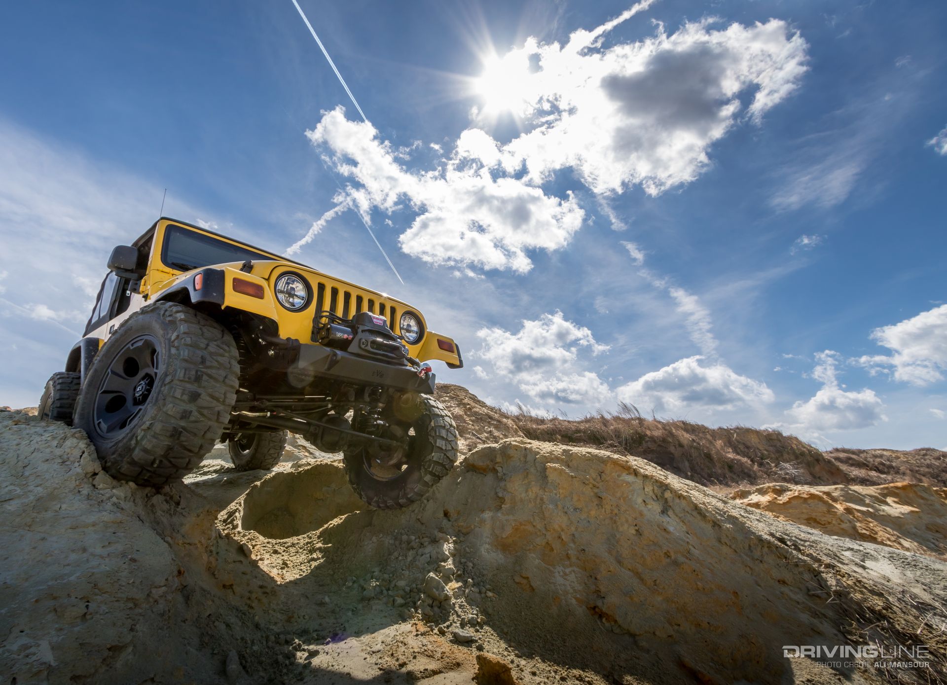 Jeep-wrangler-tj-evo-mfg-bumpers-warn-vr8-s-winch-mud-grapplers