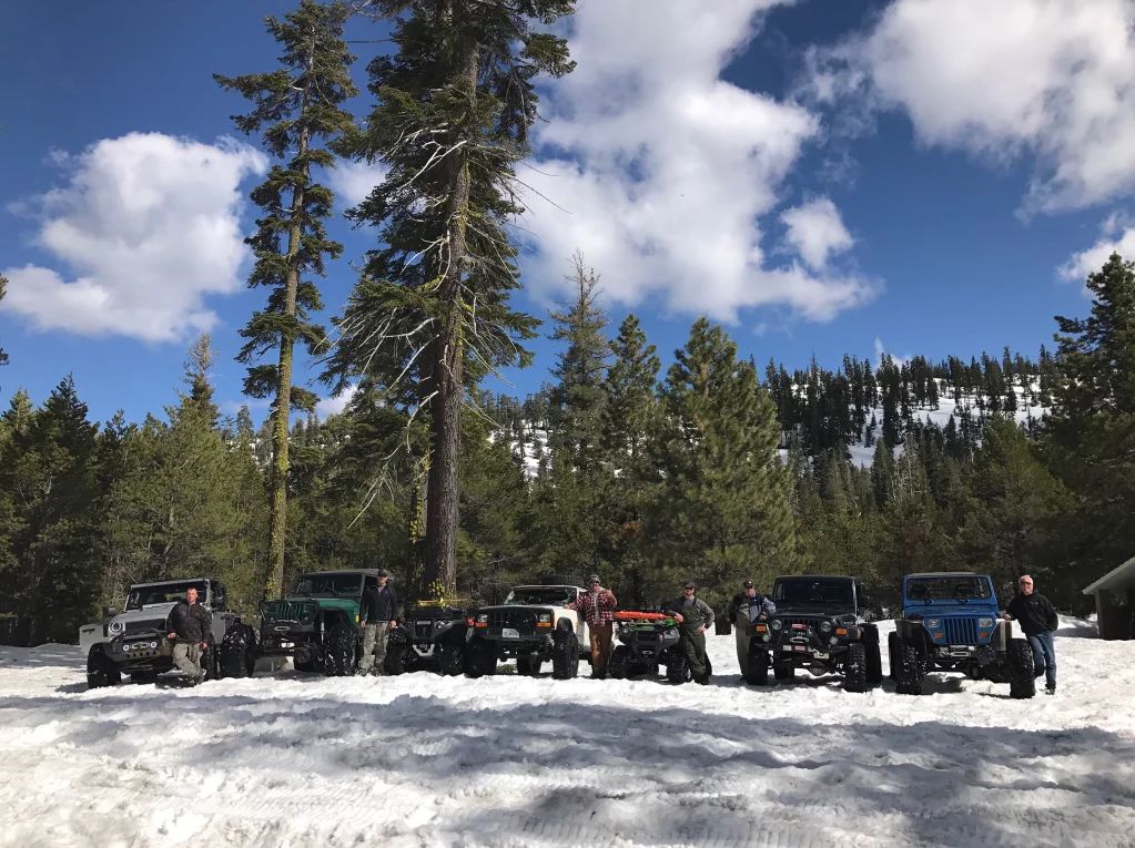 The lineup of the recovery vehicles with the rescued Cherokee in the center.