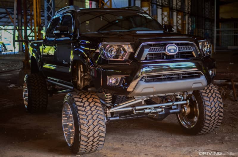 Solid-axle-swapped Tacoma front end sitting mean