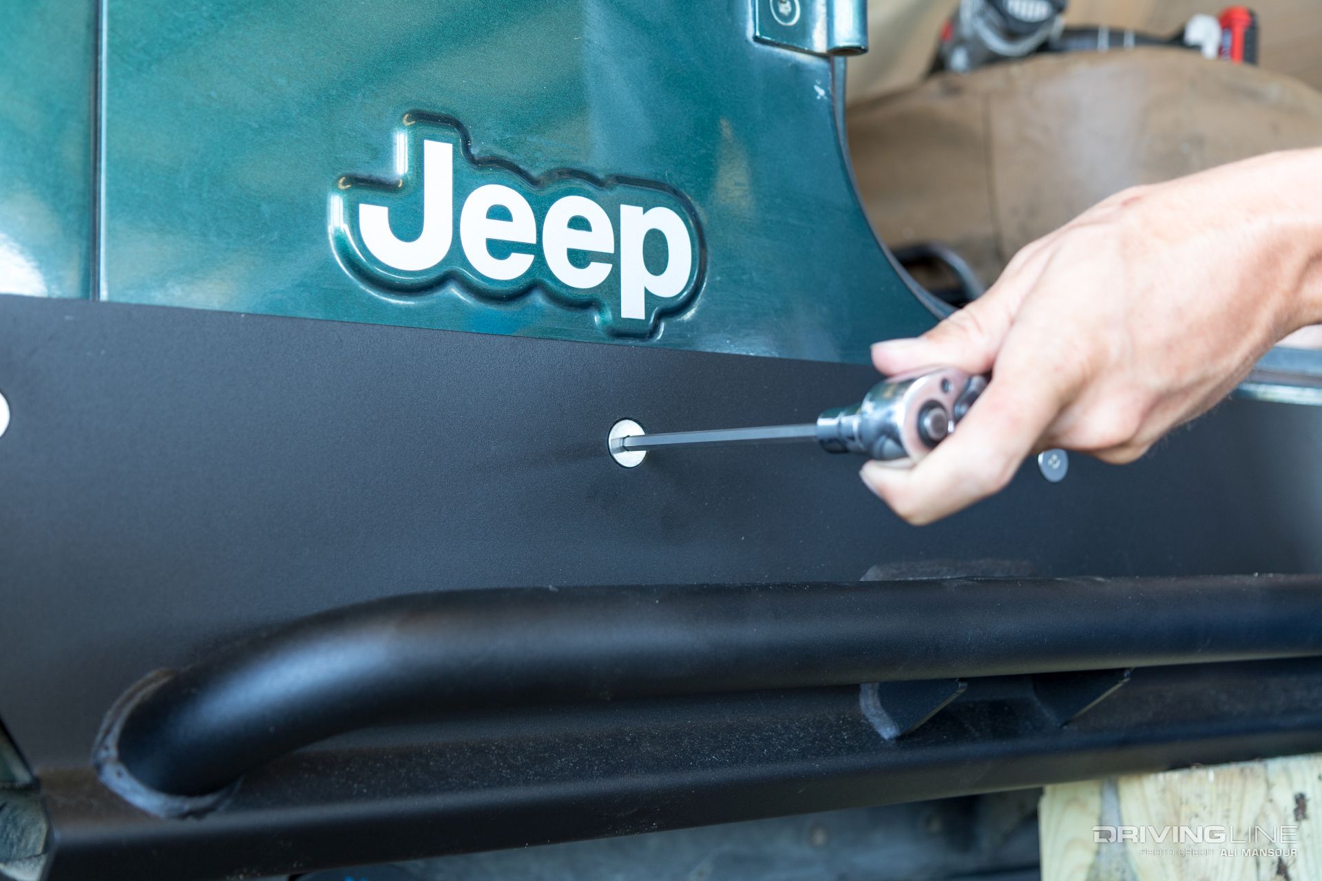 fab-fours-jeep-wrangler-tj-rock-sliders-mud-grapplers