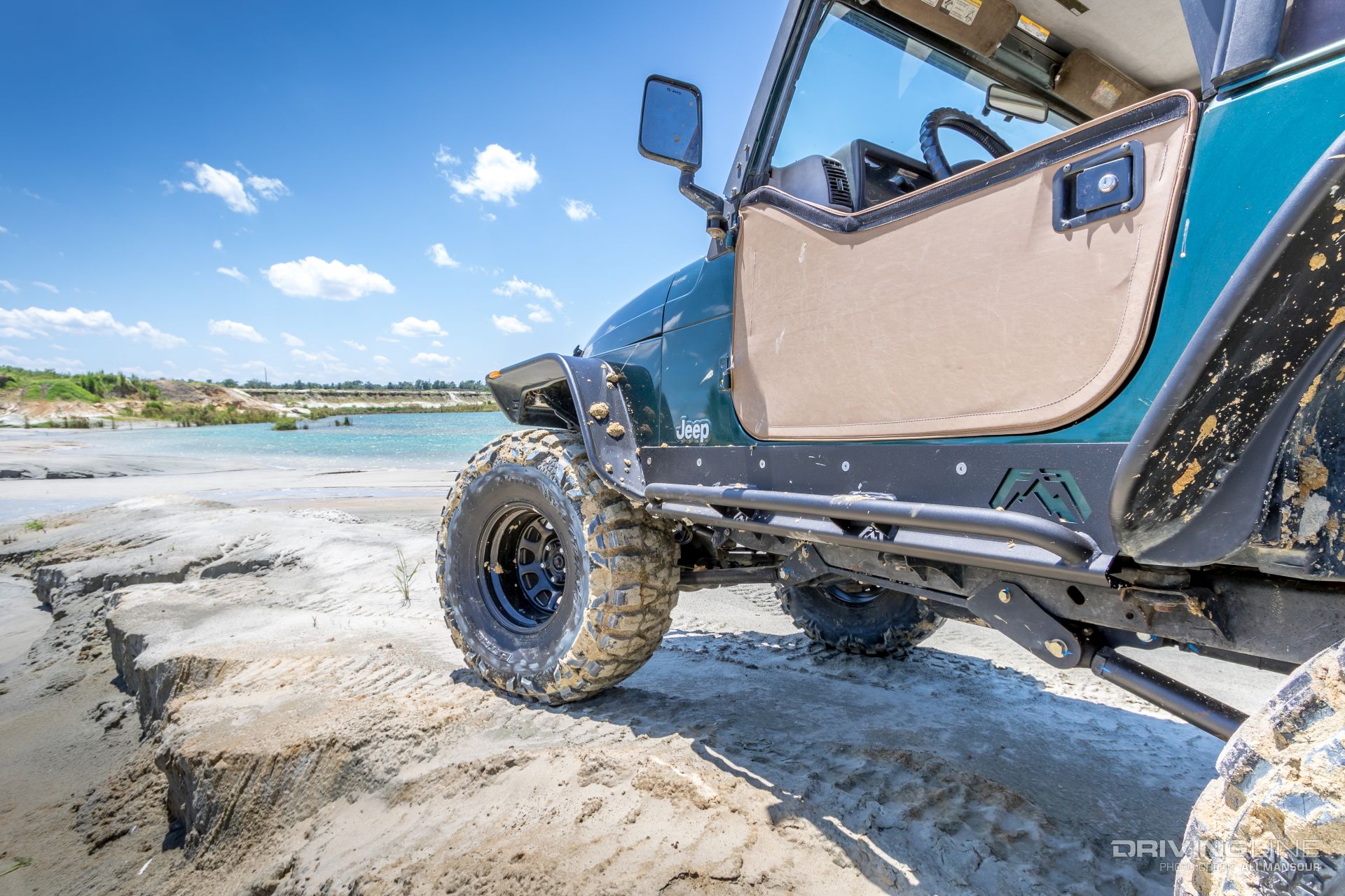 001-fab-fours-jeep-wrangler-tj-rock-sliders-mud-grapplers