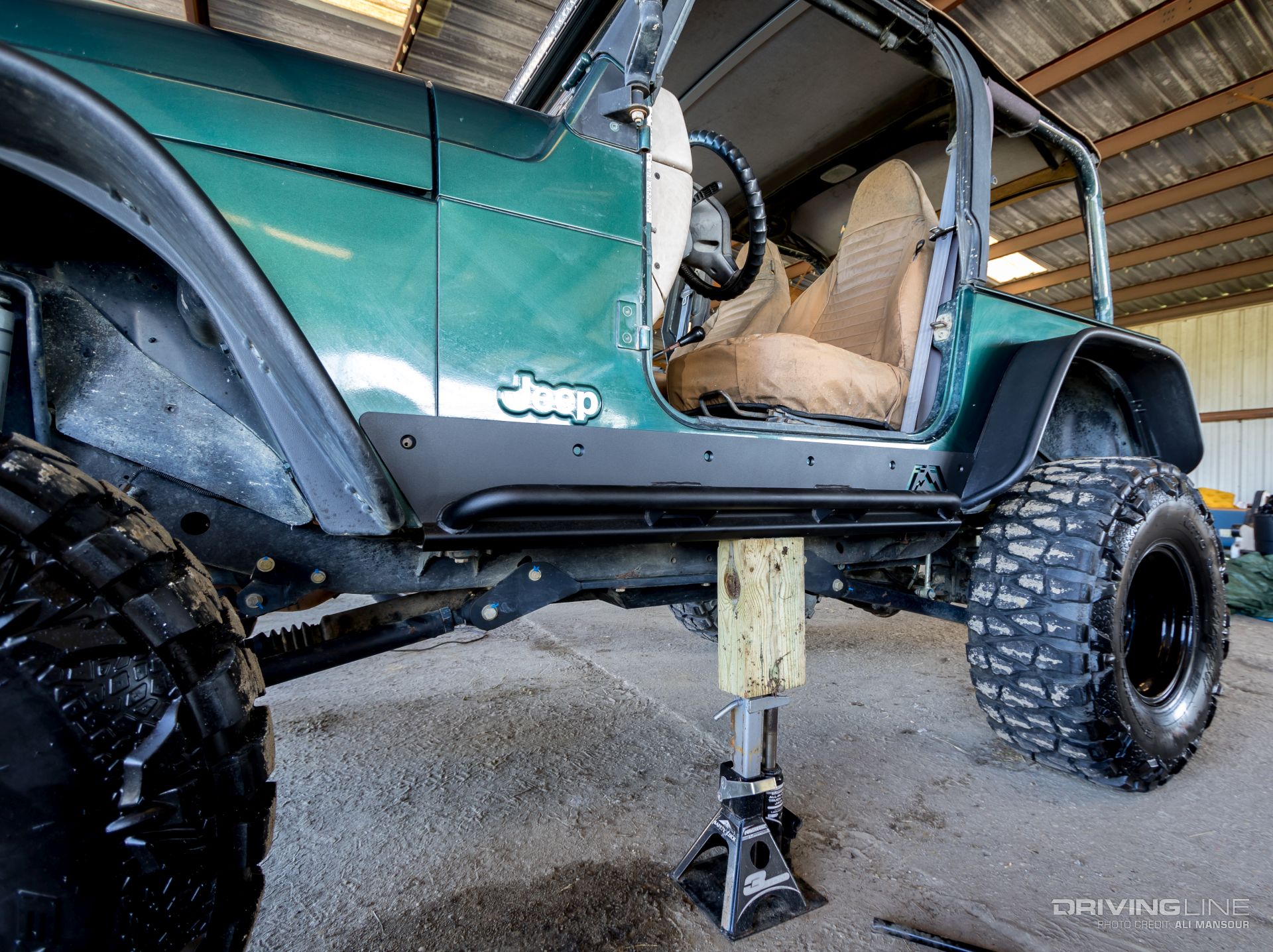 fab-fours-jeep-wrangler-tj-rock-sliders-mud-grapplers