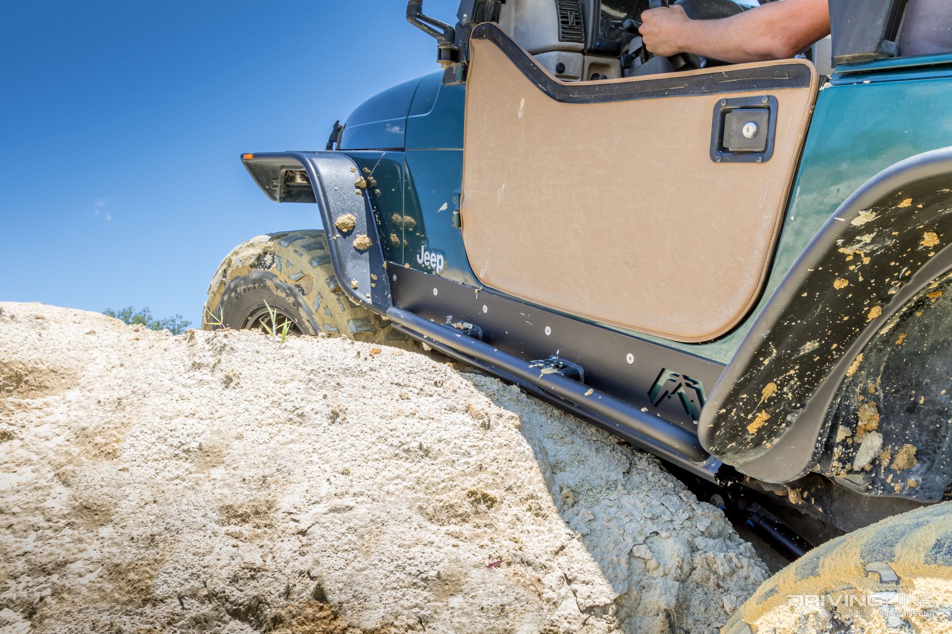 fab-fours-jeep-wrangler-tj-rock-sliders-mud-grapplers