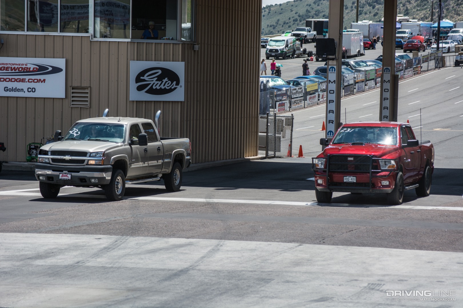 A Duramax and a Hemi Ram go head to head on a roll race