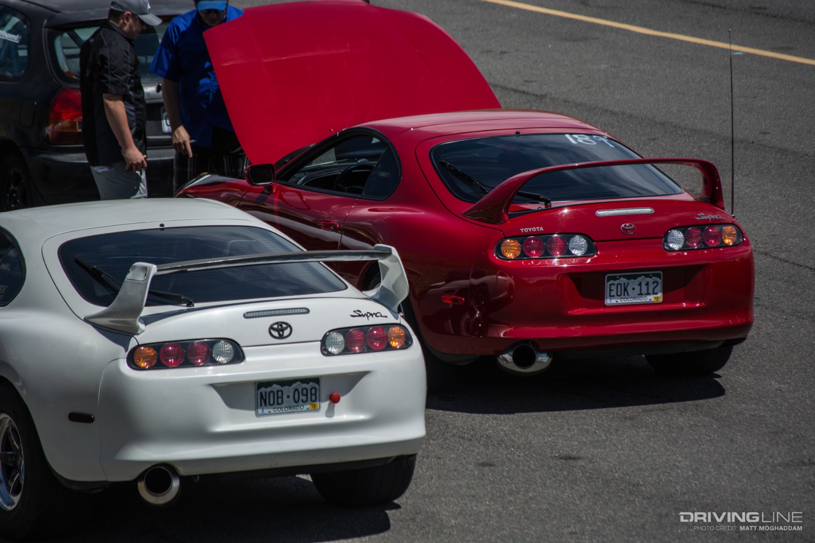 Two MKIV Supras line up at tech