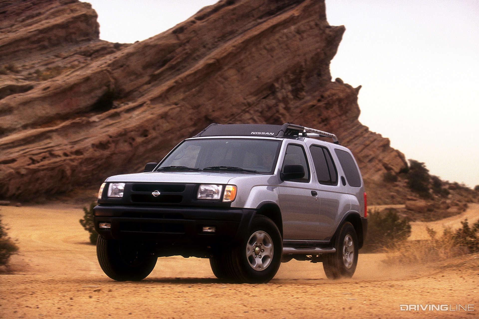 Nissan Xterra Silver in Desert
