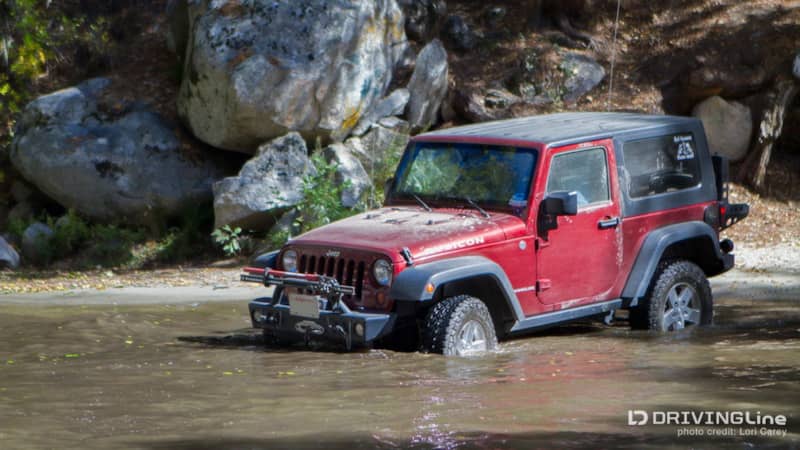 red Jeep Wrangler water crossing