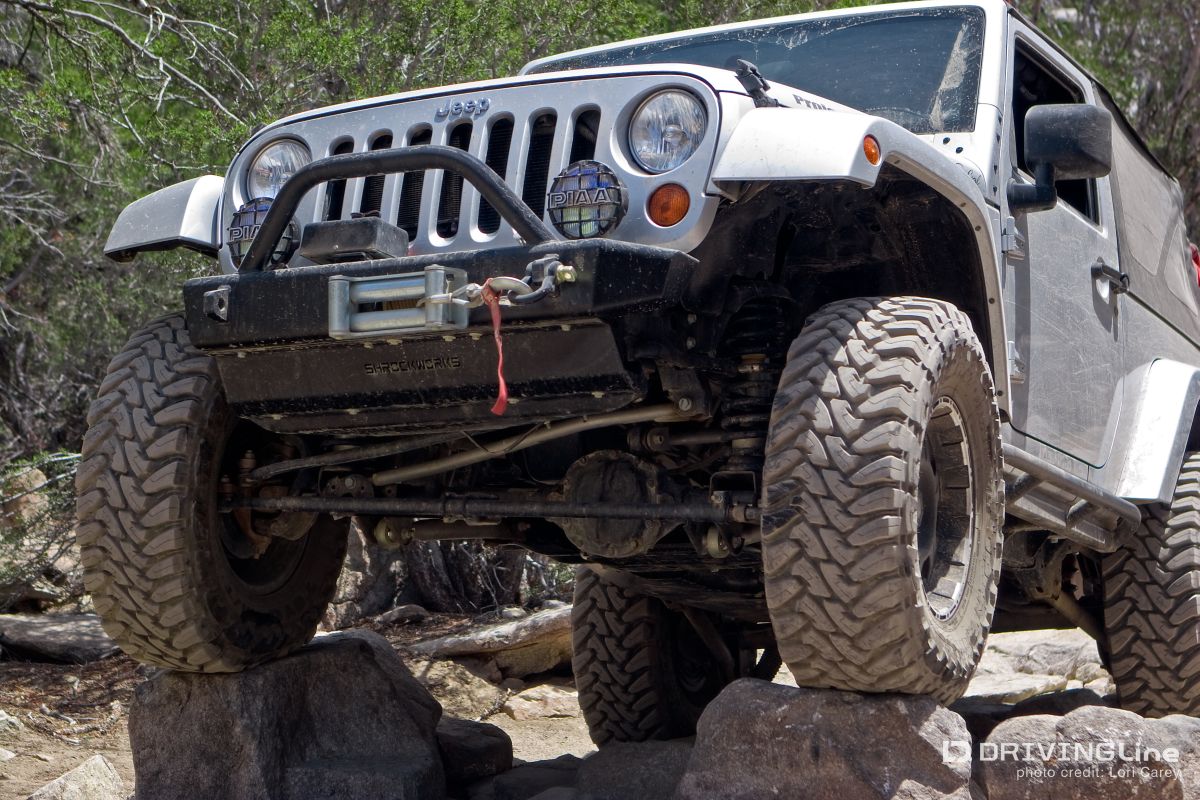 Jeep, tires on rocks, John Bull