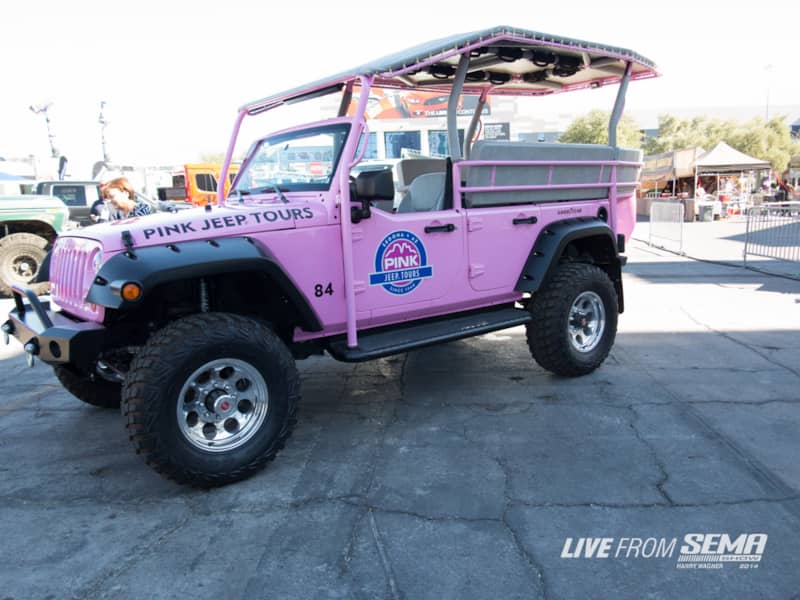 Pink Jeep Tours has been leading tours through Sedona and the Grand Canyon since 1960. As the company became more successful their vehicles grew to meet the demands of a growing business. Recently they have been using Ram trucks custom built to haul guests and fitted with a seven slot Jeep grille to honor their heritage. We are happy to see them using these custom built JKs complete with Dynatrac axles and 35-inch tall tires instead of trying to convince us that a Ram is a “Jeep”.