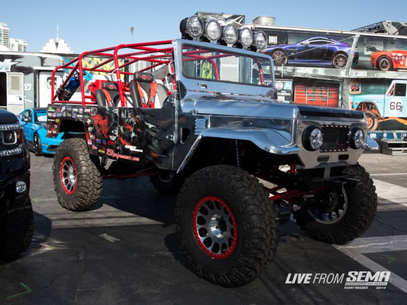 The Sniper is a four door FJ40 Land Cruiser on top of an FJ80 Land Cruiser frame. Rock Solid Off Road had the body widened eight inches to match the chassis and polished the entire thing to a mirror finish. A 383ci stroker engine turns 41-inch tires on 20-inch rims.