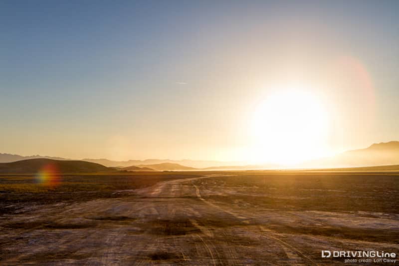 Crossing Soda Dry Lake with the sun low in the sky, on the Mojave Road