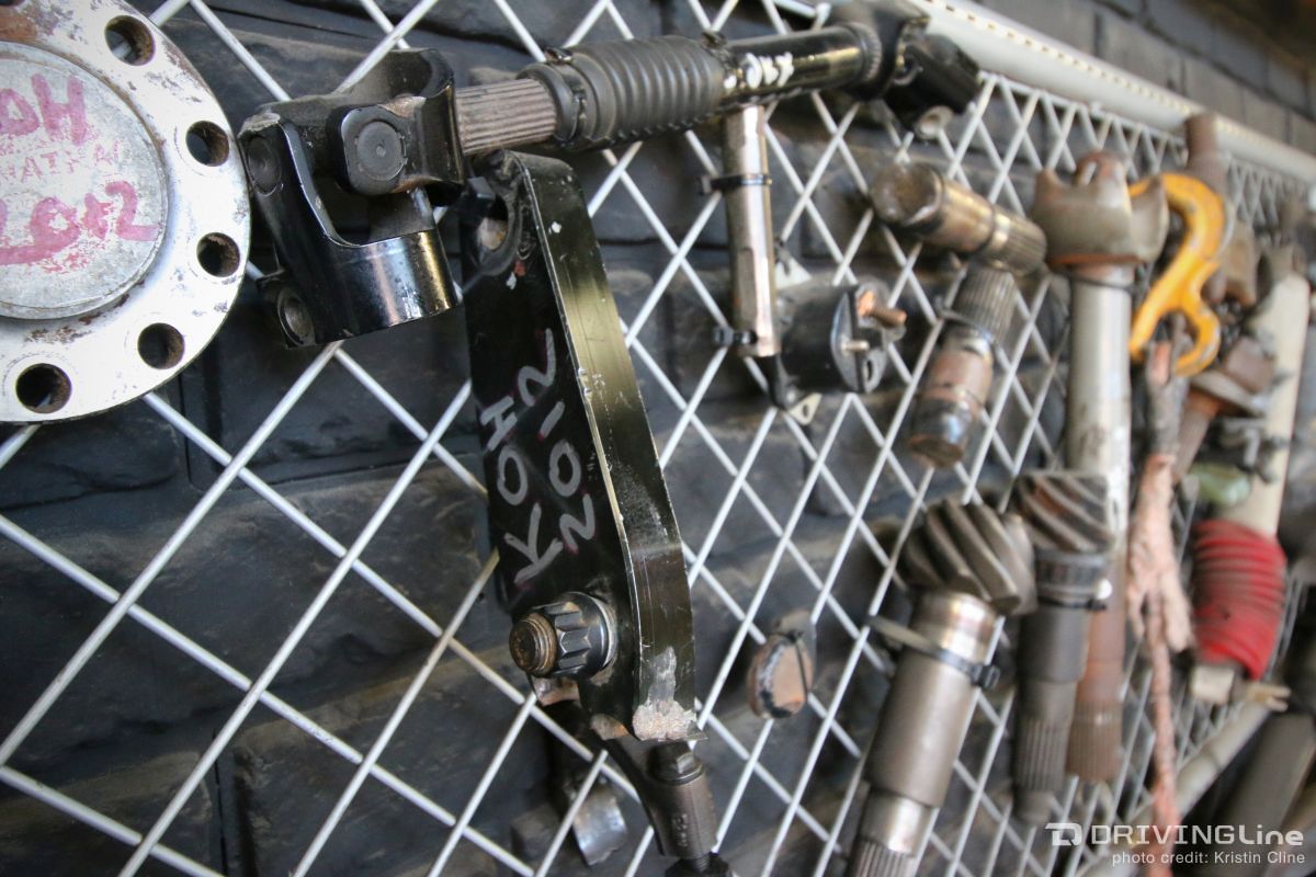 Off Road Evolution displays a graveyard of broken parts at their shop's entrance.