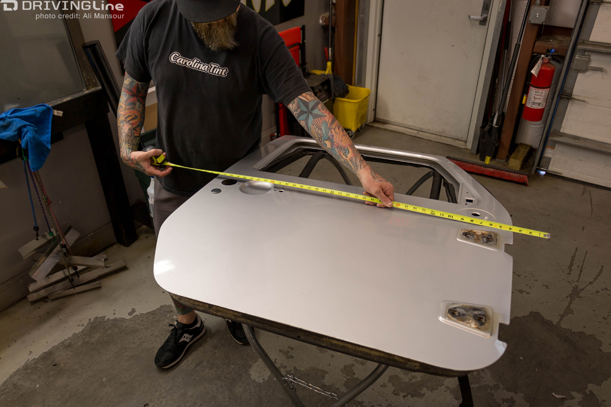 Man measuring Jeep Wrangler door