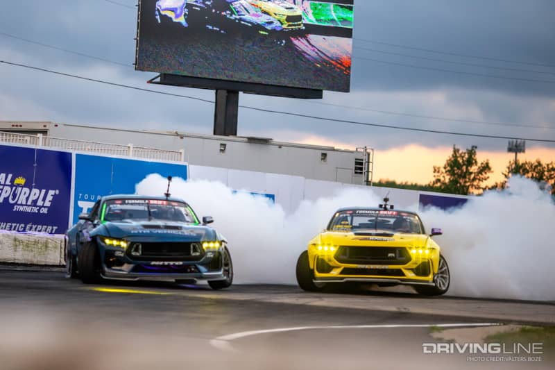 Adam LZ tandem Drifting against fellow RTR driver Chelsea DeNofa at 2023 Formula Drift New Jersey Englishtown Raceway