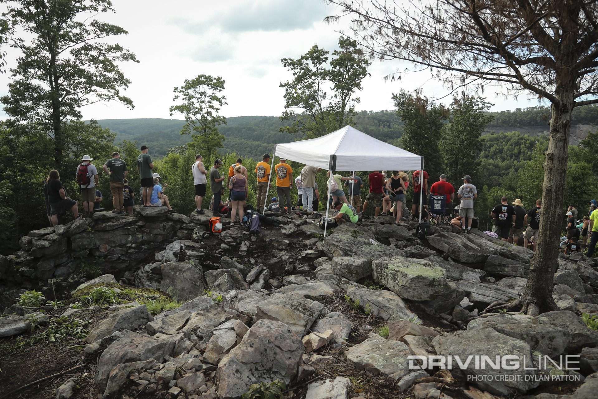 The crowds made the long hike to get the best view of the hard spots where cars would get stuck and put on a wild show.