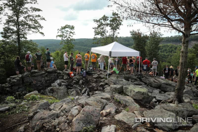 The crowds made the long hike to get the best view of the hard spots where cars would get stuck and put on a wild show.