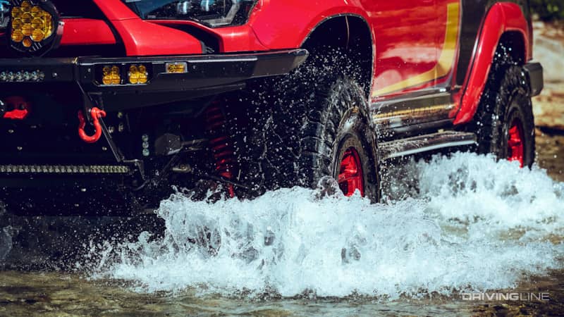 Toyota 4Runner fording water on Nittos