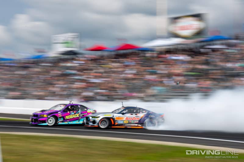 Nick Noback tandem drifting against James Deane at 2023 Formula Drift New Jersey Englishtown Raceway