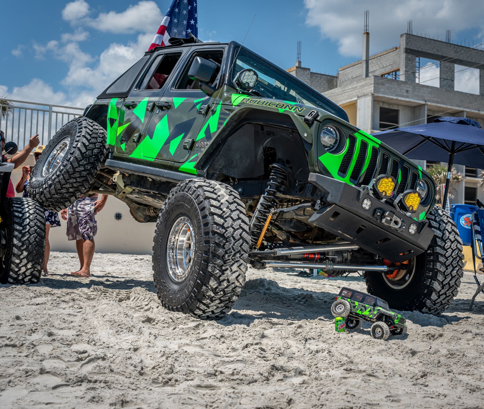 Jeep Wrangler JL parked on tire with matching rc Jeep Beach 2024