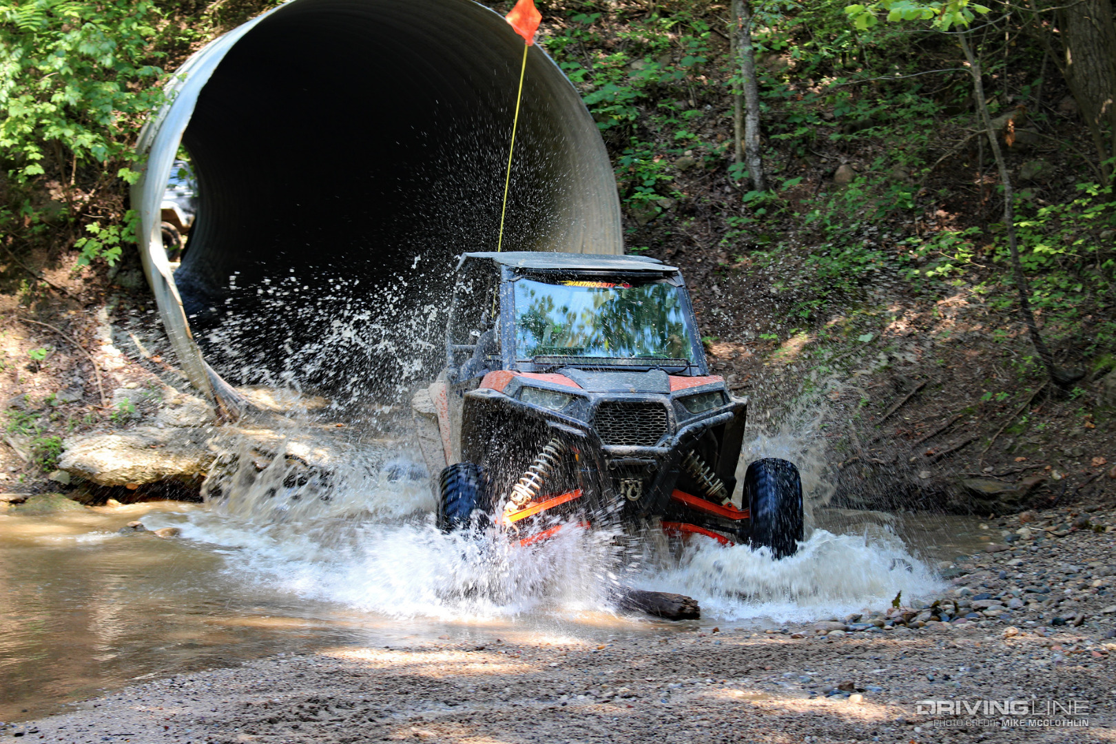 UTV bursting out of water pipe