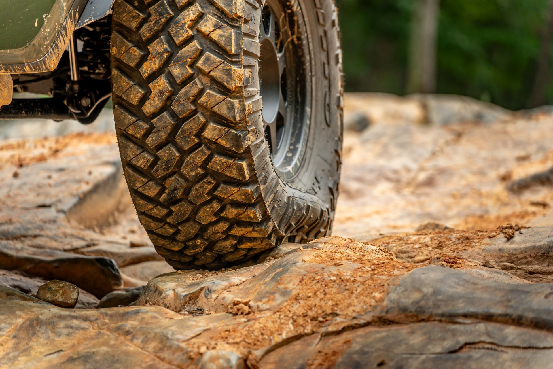 38 Nitto Trail Grappler off-road driving over rock with low tire air pressure