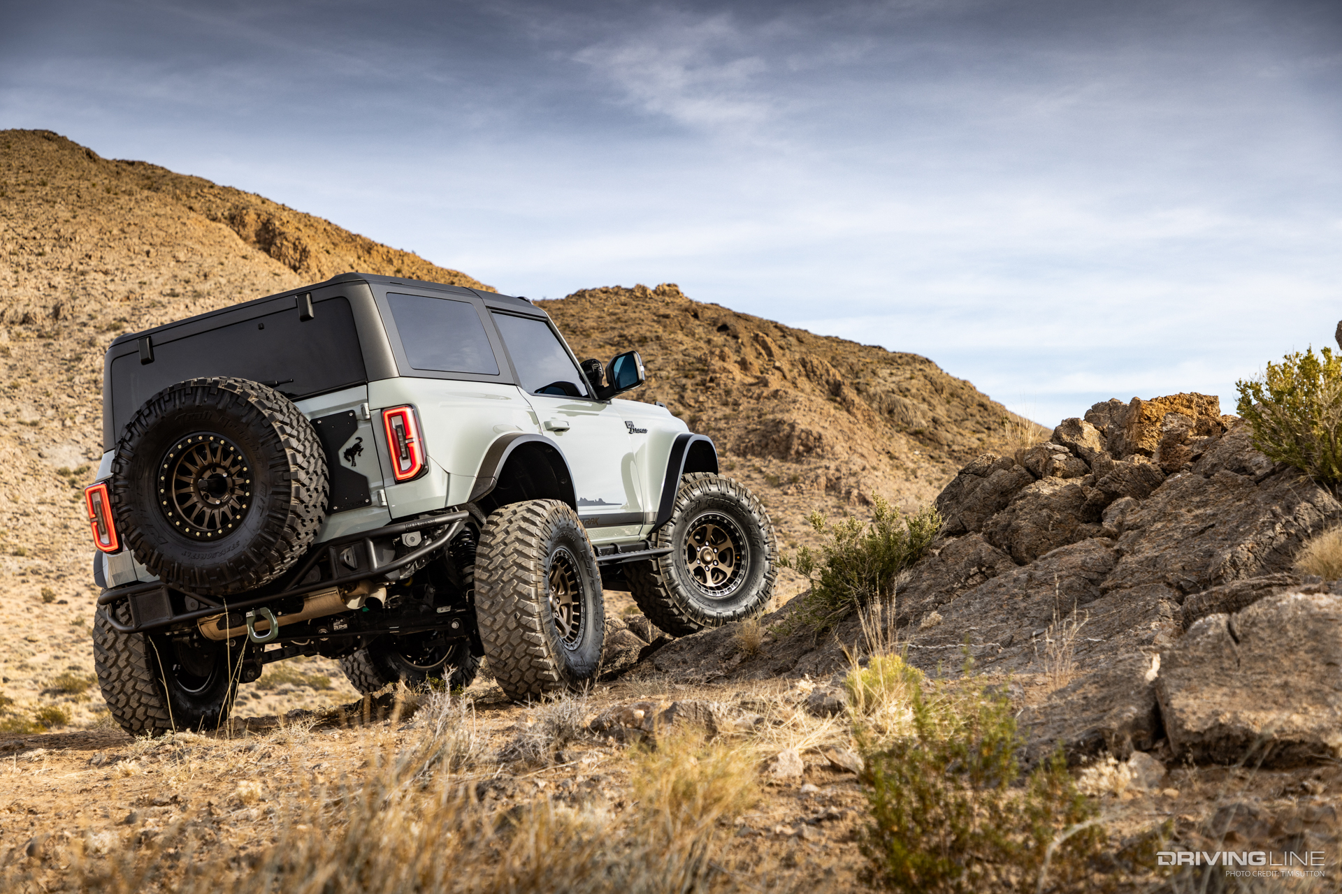 Rear passenger side of a modified 2021 Ford Bronco with Nitto Trail Grappler tires