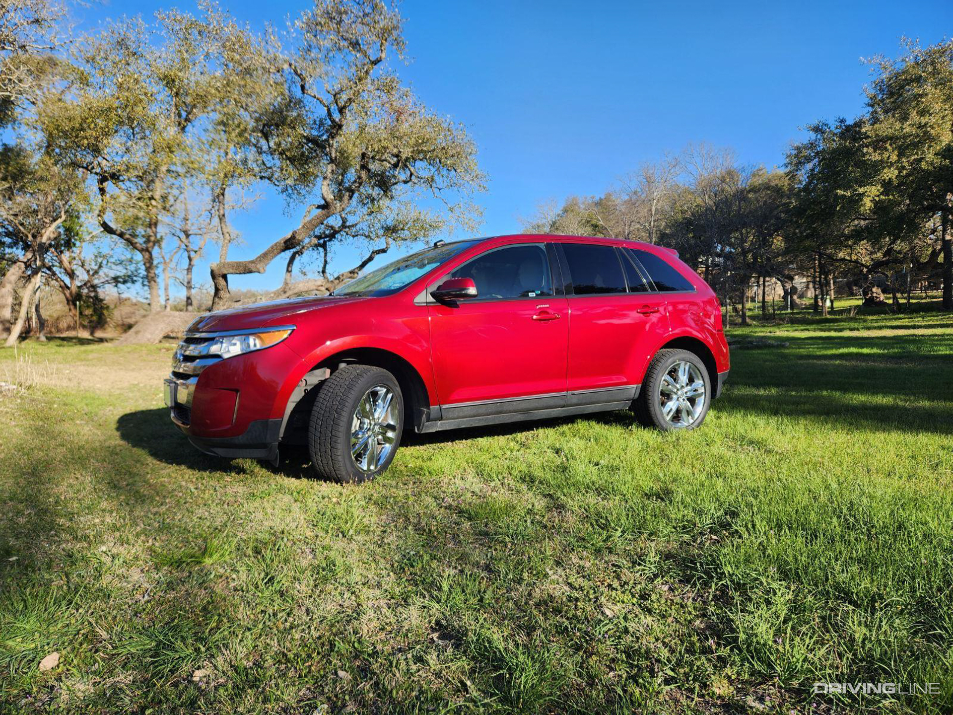 Red 2014 Ford Edge on Nitto Motivo 365 Tires
