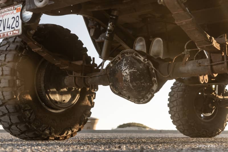 nitto mud grapplers on rear axle of toyota fj40 truck