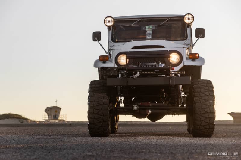 toyota fj40 running nitto mud grappler tires at the beach