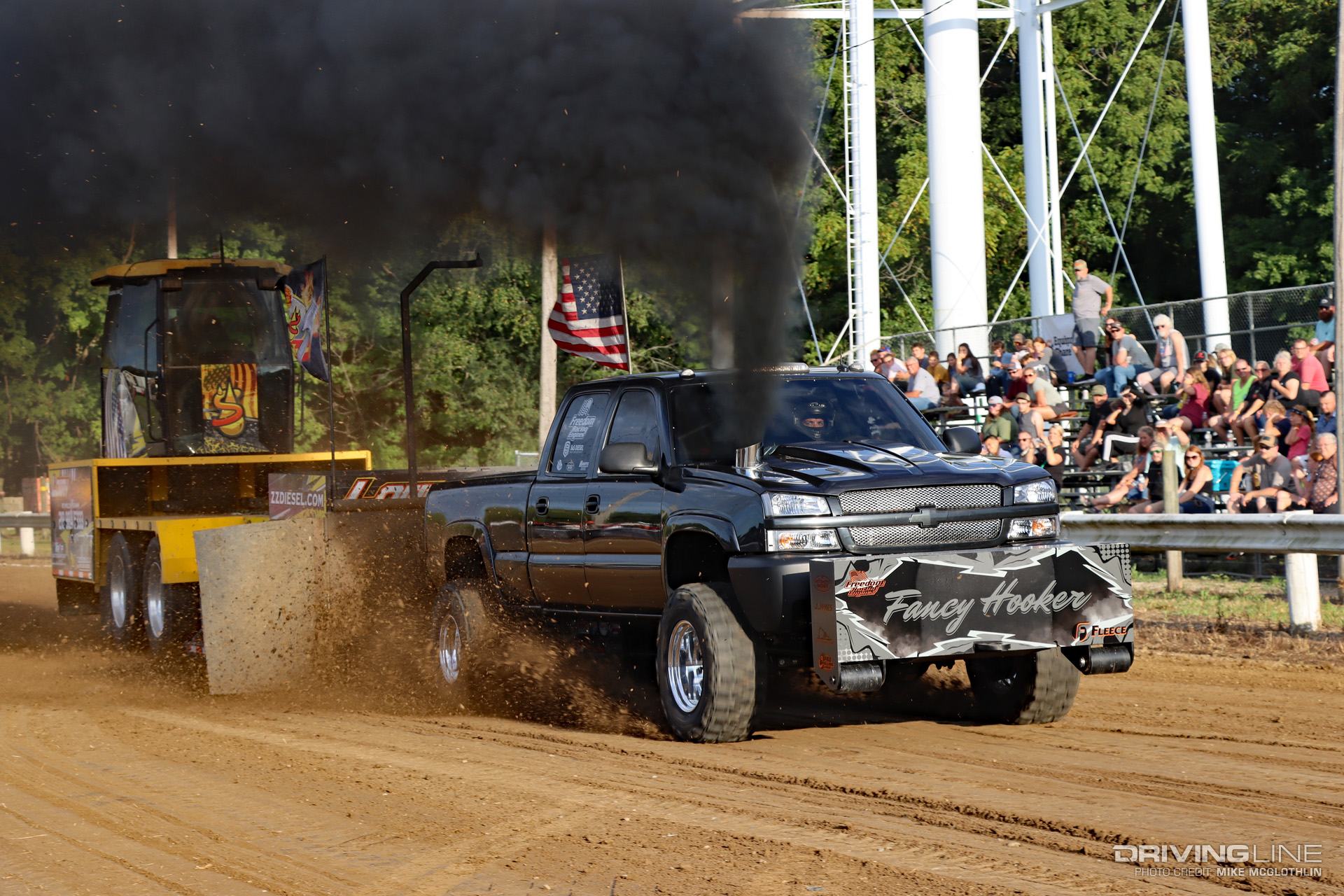 Chevrolet Silverado HD Cummins Conversion Diesel Truck Pulling on Nitto Mud Grappler tires