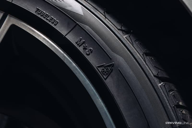 Tire Sidewall detail of three peak mountain snowflake on Nitto Motivo 365 All-Season tire