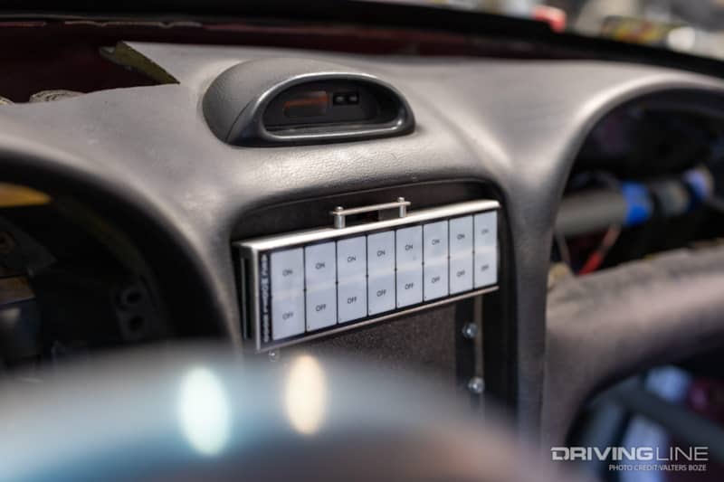switches on the dash of an Ecoboost swapped fox body mustang