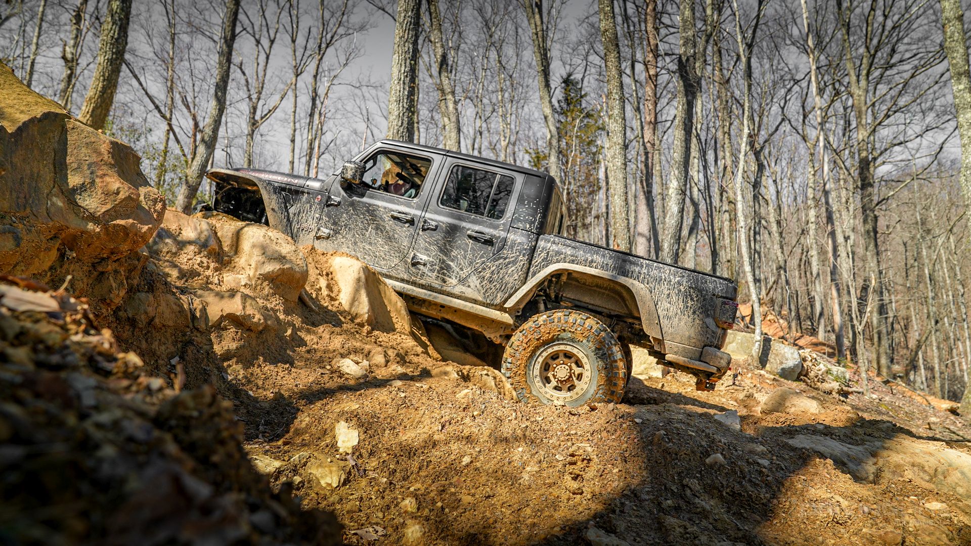 Jeep Gladiator Rubicon on 40s climbing windrock trail 16