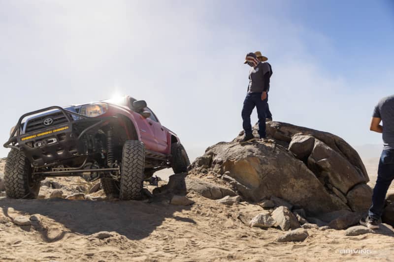 Spotting a red toyota tacoma off-road in johnson valley