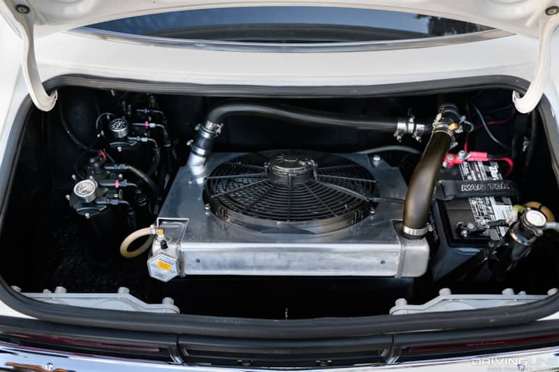 radiator in the trunk of a highly modified 1974 Toyota Celica