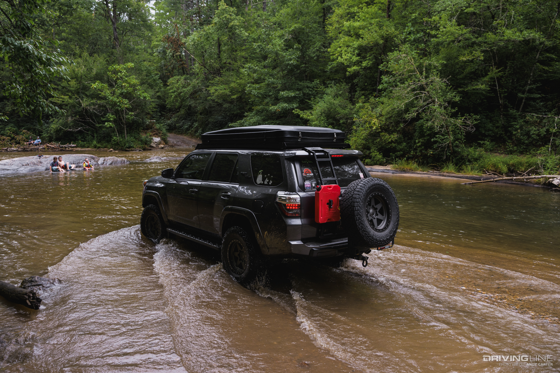 Toyota 4Runner on Nitto Recon Grappler tires driving in shallow standing water
