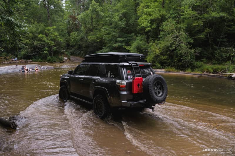 Toyota 4Runner on Nitto Recon Grappler tires driving in shallow standing water