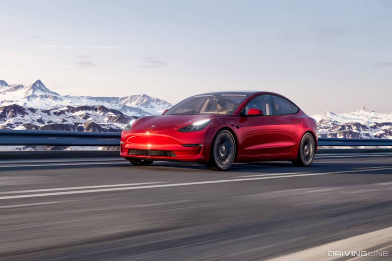 Red Tesla Model 3 Performance on Road