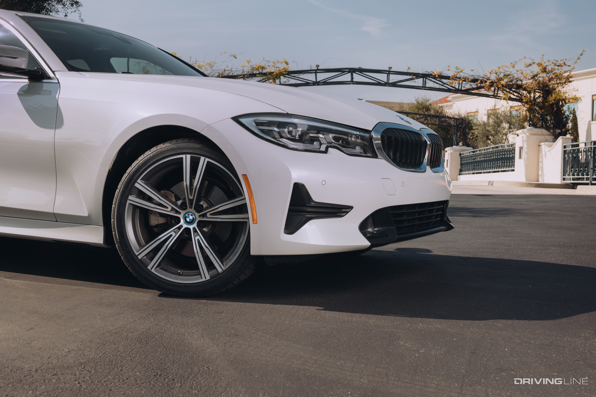 Nitto Motivo 365 all-weather tire with 3PMSF rating mounted on a white BMW