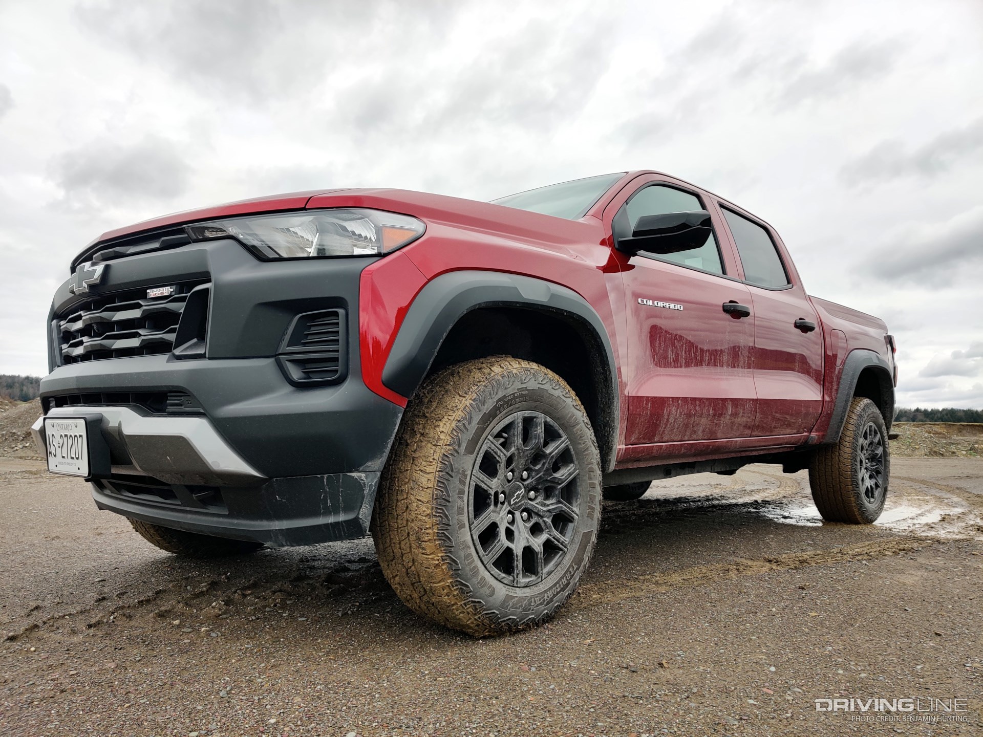 2023 Chevrolet Colorado Trail Boss front 3/4 view red in sand pit