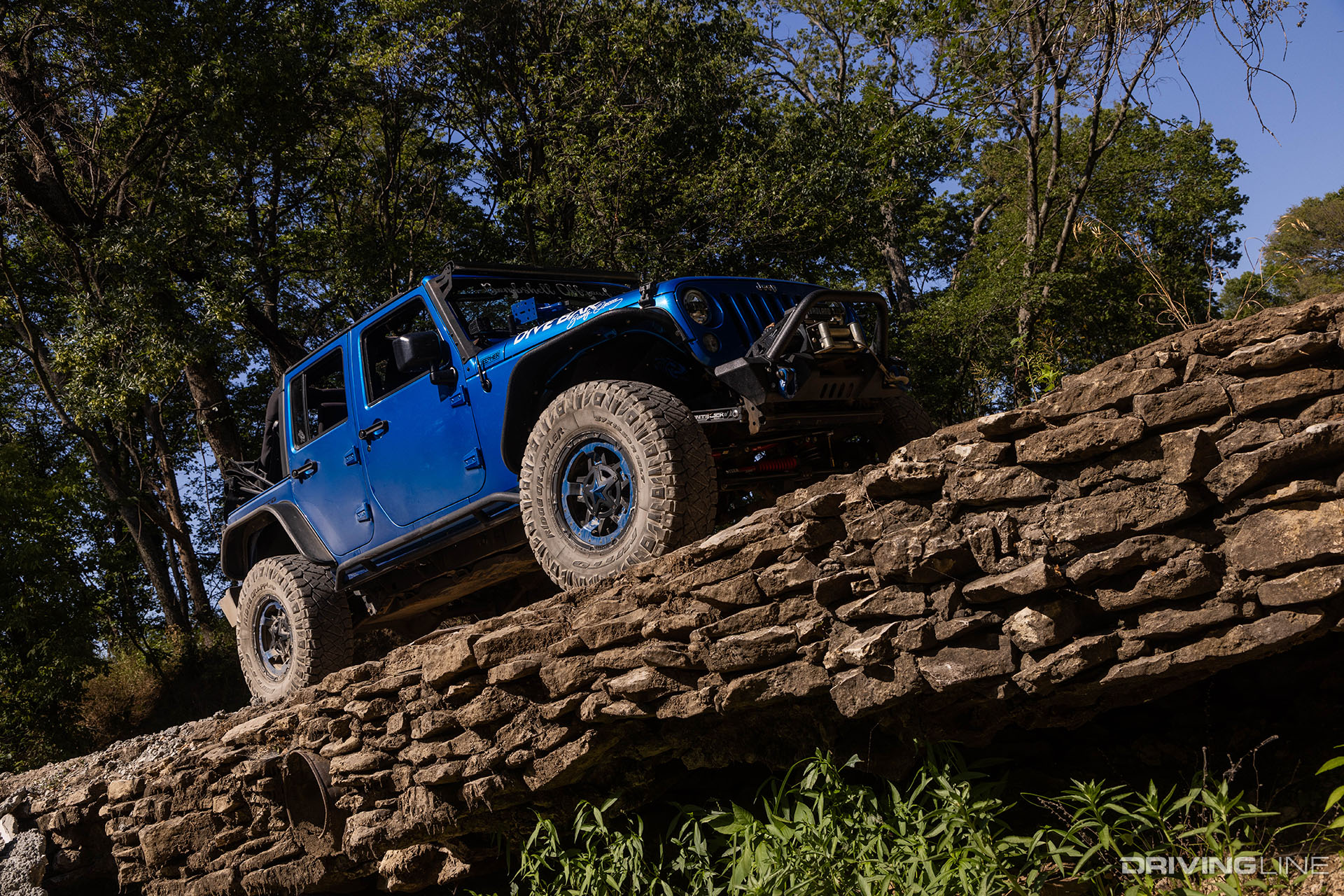 Blue Jeep Wrangler on Nitto Ridge Grappler tires